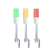Diffused pole-mounted tower light on right-angle brackets, demonstrating color options; Green-Amber-Red on a  white background.