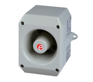 A gray metal industrial speaker with a red marking on the front.