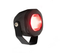 A black safety indicator for forklift trucks with a red light illuminated, mounted on an adjustable bracket.