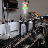 Andon cycle timer light in an aluminum canning facility.