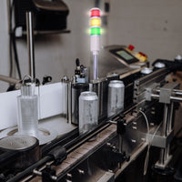 Andon cycle timer light in an aluminum canning facility.