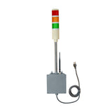 Industrial safety light tower with red, yellow, and green lights on a white background.