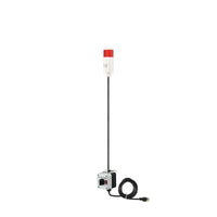Red pole-mounted industrial signal with 3-position switch on a white background.