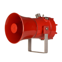 Red explosion proof high output alarm horn sounder with re-entrant flare horn, mounted on a bracket.