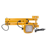 Yellow metal bracket with a light fixture on a white background