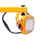Yellow work light with black cord on a white background.