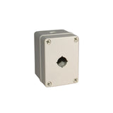 Light grey push button box with single button hole; held together with 4 phillips head screws on a white background.