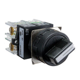 A black maintained 3 position toggle switch in the third of three position with a label indicating 22mm size and electrical details.