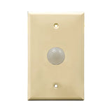 Ivory wall plate with white pilot light on a white background.
