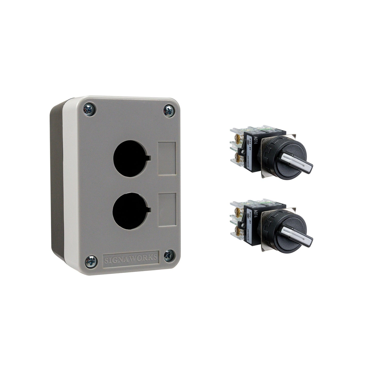 Black and grey push button box with two holes, held together by four phillips head screws next to two black and white 2-position selector switches on a white background.