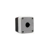 Grey front quarter perspective of a push single push button enclosure with a mounting hole and four phillips head screws holding the enclosure together on a white background.