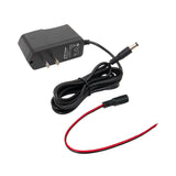 Black power adapter with a black and red cable on a white background.