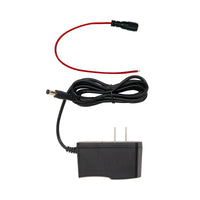Black power adapter with red and black cables on a white background.