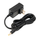 Black power adapter with a cable on a white background