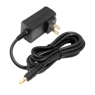 Black power adapter with a cable on a white background