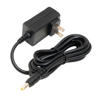 Black power adapter with a cable on a white background