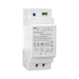 Angled perspective of white DIN rail-mounted power supply with adjustment dials and specs label.