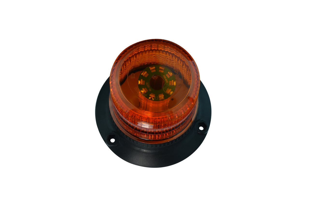 A large LED strobe light with a circular amber lens designed for industrial signaling with a black base.
