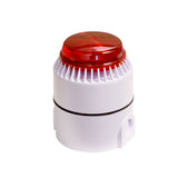 A set of three white audible alarm and strobe units with one having a red cover on top.