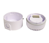 White plastic base components with electronic contacts on a white background.