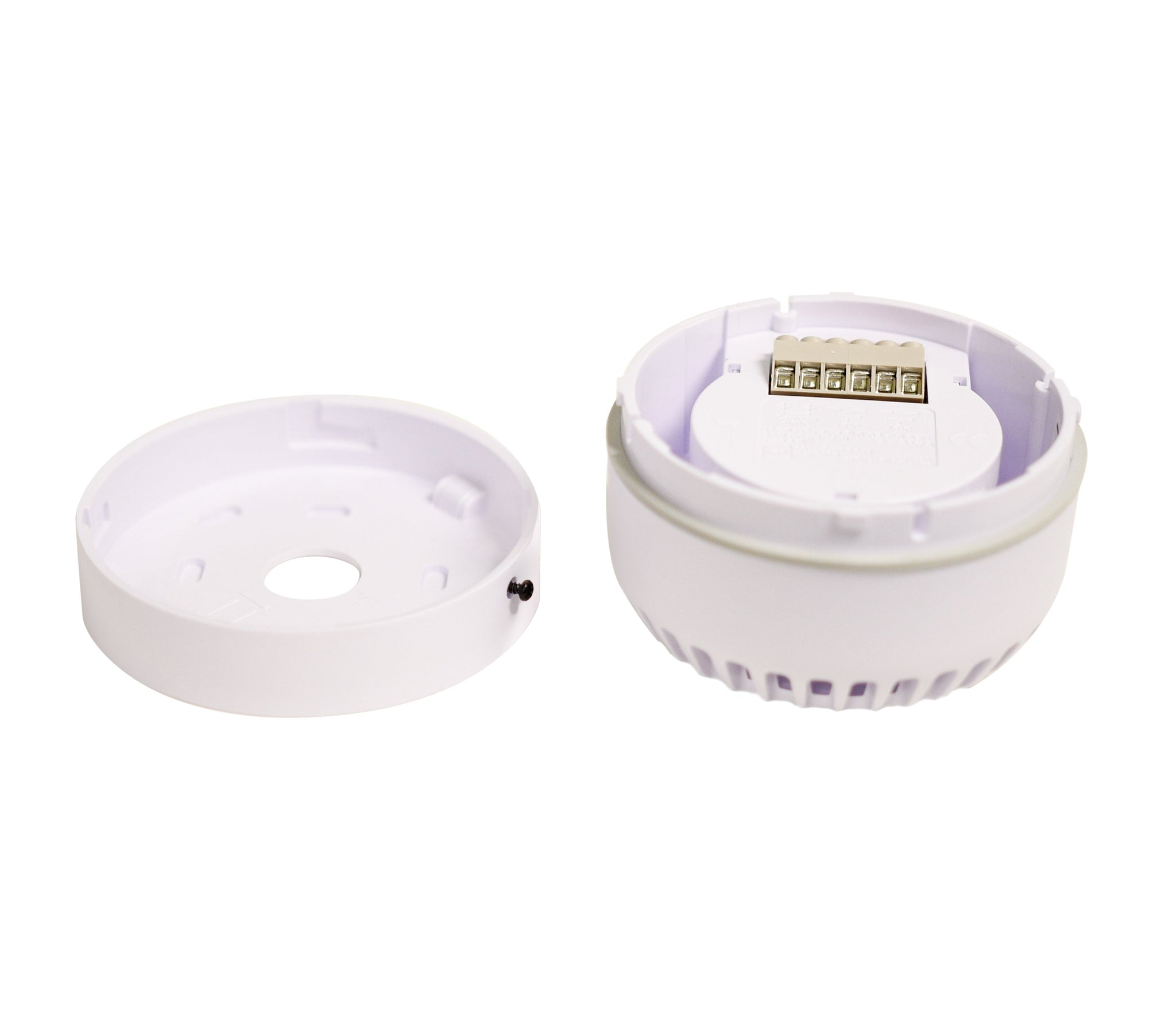Short white plastic base components with electronic contacts on a white background.