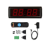 Digital clock with remote control, power adapter, and mounting hardware on a white background