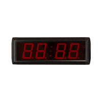 Digital clock with red LED display on a white background.