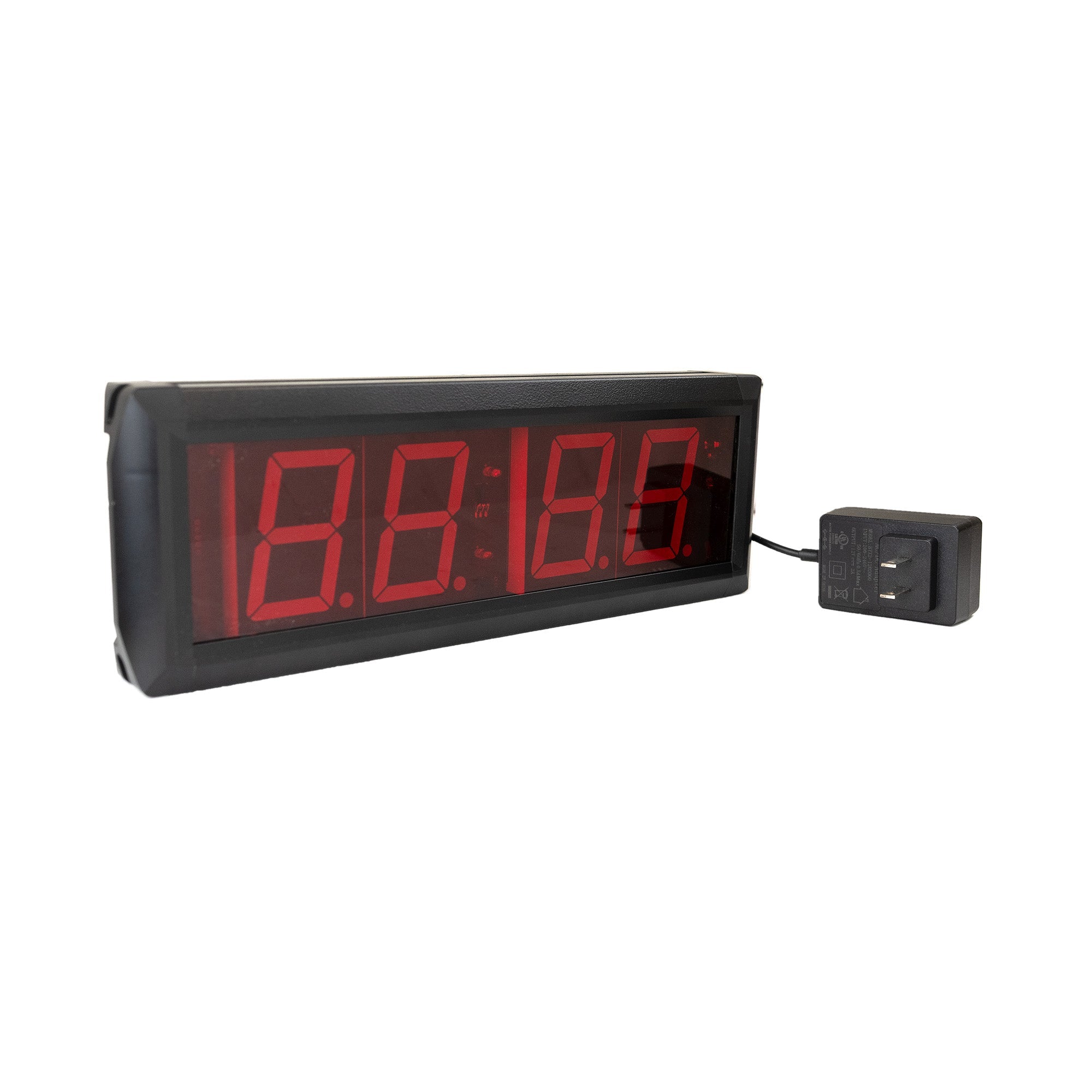 Digital clock with red LED display on a white background.