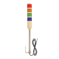 Four-Color industrial pole-mounted tower light with black cable and red, amber, green, and blue prism lenses on a white background.