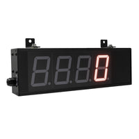 Angled view of a black two inch digital display with red illuminated letters.