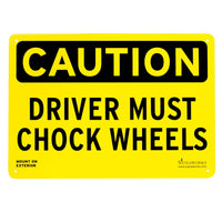 Black and yellow sign stating, "DRIVER MUST CHOCK WHEELS," on a white background.