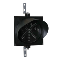A 12 inch diameter 2-in-1 lens LED traffic light with red X and arrow signals, mounted on a black housing with two steel right angle mounting brackets.