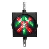 A 12 inch diameter 2-in-1 lens LED traffic light with red X and green arrow signals, mounted on a black housing with two steel right angle mounting brackets.