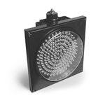 A 12 inch diameter 2-in-1 lens LED traffic light mounted on a black housing with visor removed.