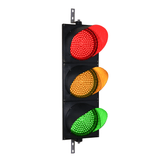 Triple lens 12 inch red, amber and green traffic light with steel mounting brackets on a white background.