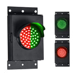 Set of traffic light components including a red and green light, and two smaller red lights on a white background.