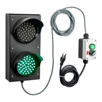 Traffic light system with green LED lights, control box and cables on a white background.