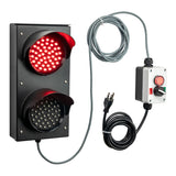 Red traffic light with control box and cables on a white background.