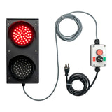Red traffic light with control panel and cables on a white background.