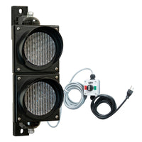 Two traffic lights with a control box and cables on a white background.