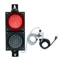 Traffic light system with red LED light, control box and cables on a white background.