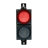 Red four inch traffic light with black plastic housing and mounting brackets.