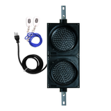 Black wireless 8 inch traffic light with white wireless key fob on a white background.