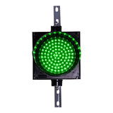 Green 8 inch traffic light on a white background.
