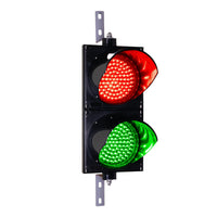 8 inch traffic light illuminated in red and green on a white background.