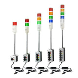 Collection of multicolored industrial signals with 2-position switches and USB cables on a white background