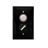 An black rectangular wall plate with a white pilot light and a black rotary dial.