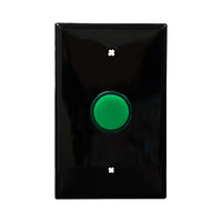 Black wall plate with green LED pilot lights mounted on a white background.