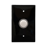 Black wall plate with white LED pilot lights mounted on a white background.