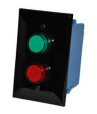 Black wall plate with red and green dual LED pilot lights mounted on a white background.